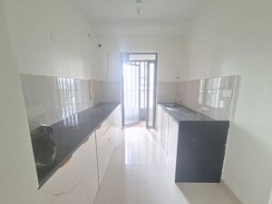 Kitchen in 2 BHK Apartment at Kalpataru Paramount, Kapur Bawdi – for Rent