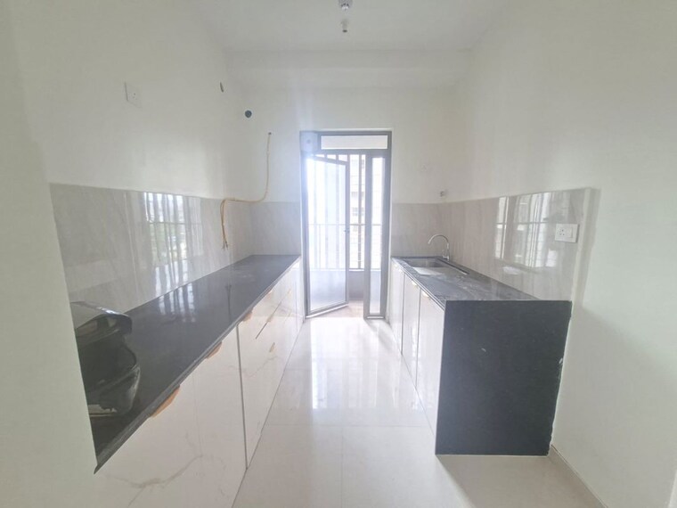 Kitchen, kalpataru-paramount 2 Bedroom 711 Sq.Ft. Apartment In Kapur Bawdi Thane 10339389