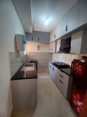 Kitchen in 2 BHK Apartment at Bhartiya City Nikoo Homes II, Thanisandra Main Road – for Rent