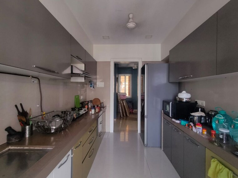 Kitchen, dosti-imperia-elecia-chsl 2 Bedroom 750 Sq.Ft. Apartment In Ghodbunder Road Thane 10339405