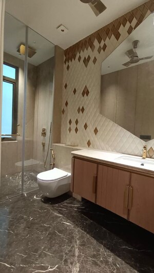 Bathroom in 3.5 BHK Apartment at Defence Colony – for Sale