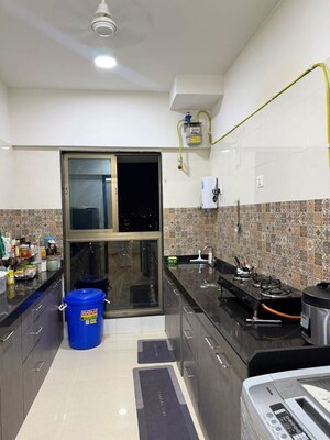 Kitchen in 2 BHK Apartment at Rajesh Raj Infinia, Malad West – for Rent