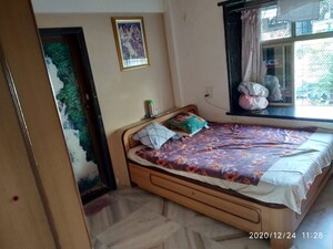 Bedroom in 2 BHK Apartment at Bhoomi Enclave, Kandivali West – for Rent
