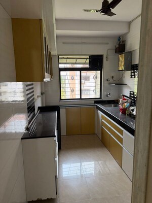 Kitchen in 2 BHK Apartment at Bhoomi Enclave, Kandivali West – for Rent