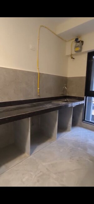 Kitchen in 1 BHK Apartment at Ajmera Boulevard, Malad West – for Rent