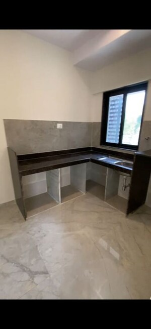 Kitchen in 2 BHK Apartment at Ajmera Boulevard, Malad West – for Rent