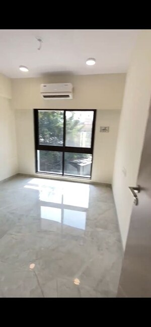 Master Bedroom in 2 BHK Apartment at Ajmera Boulevard, Malad West – for Rent