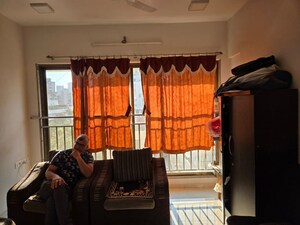 Living Room in 2 BHK Apartment at Shree Krishna CHS Kandivali, Kandivali West – for Rent