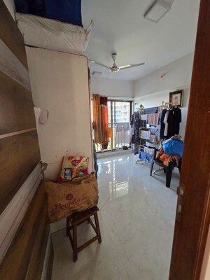 Living Room in 2 BHK Apartment at Shree Krishna CHS Kandivali, Kandivali West – for Rent