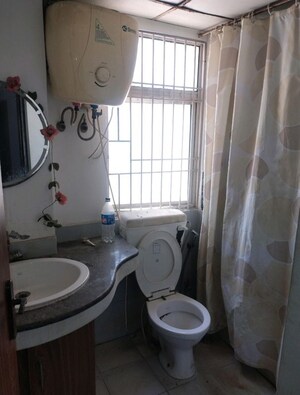 Bathroom in 3 BHK Apartment at Nimbus Express Park View, Chi V Greater Noida – for Rent