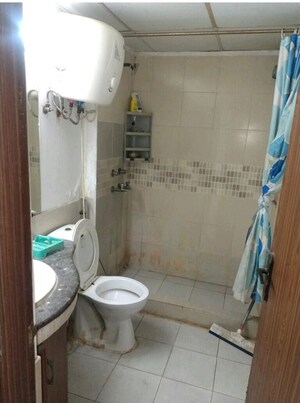 Bathroom in 3 BHK Apartment at Nimbus Express Park View, Chi V Greater Noida – for Rent