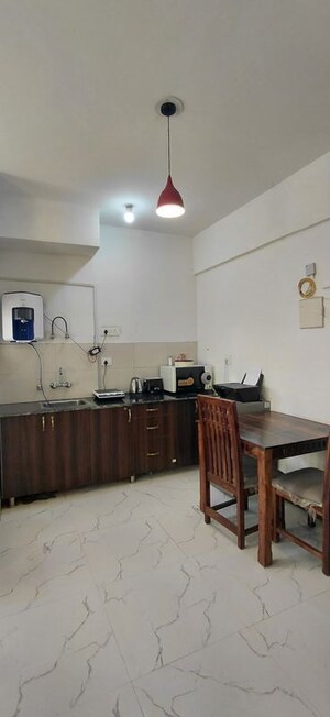 Kitchen in Studio Apartment at Earthcon Casa Grande II, Chi V Greater Noida – for Rent