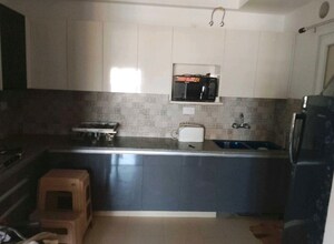 Kitchen in 3 BHK Apartment at Purvanchal Royal City, Chi V Greater Noida – for Rent