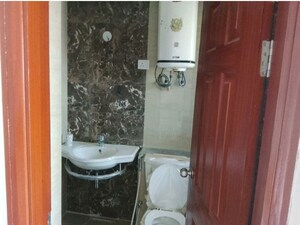 Bathroom in 3 BHK Apartment at Purvanchal Royal City, Chi V Greater Noida – for Rent