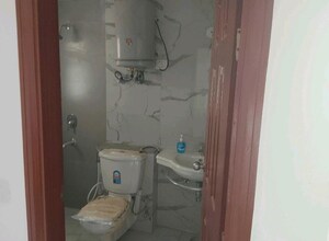 Bathroom in 3 BHK Apartment at Purvanchal Royal City, Chi V Greater Noida – for Rent