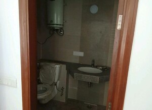 Bathroom in 3 BHK Apartment at Purvanchal Royal City, Chi V Greater Noida – for Rent