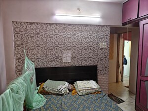 Bedroom in 2 BHK Apartment at Sai Dham CHS Kandivali, Kandivali West – for Rent