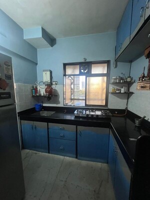 Kitchen in 2 BHK Apartment at Atul Blue Arch, Kandivali West – for Rent