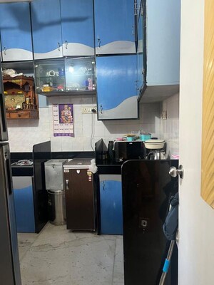 Kitchen in 2 BHK Apartment at Atul Blue Arch, Kandivali West – for Rent