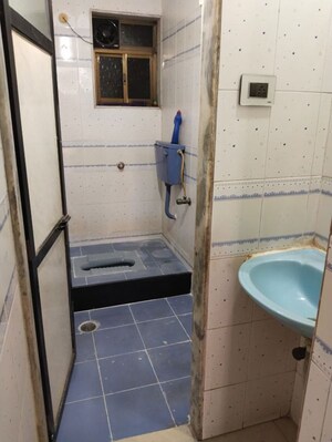 Bathroom in 2 BHK Apartment at Asha Harmony, Khanda Colony – for Rent
