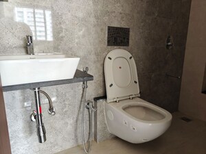 Bathroom in 1 BHK Apartment at Omkar Signet, Malad East – for Rent