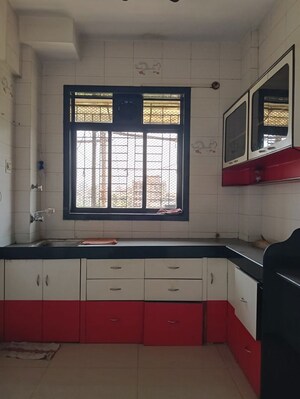 Kitchen in 2 BHK Apartment at Himalaya Ashish Apartment, Dombivli West – for Sale