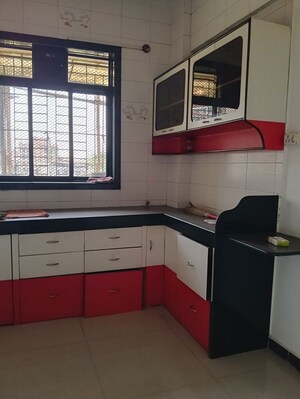 Kitchen in 2 BHK Apartment at Himalaya Ashish Apartment, Dombivli West – for Sale