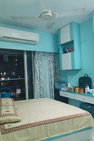 Bedroom in 2 BHK Apartment at Rizvi Oak, Malad East – for Rent