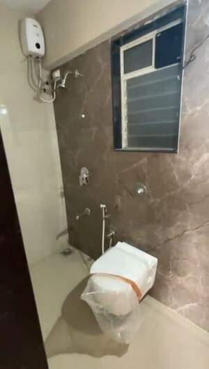 Washroom in 3 BHK Apartment at Haware Intelligentia Axis, Borivali East – for Rent