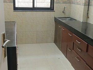 Kitchen in 2 BHK Apartment at K Raheja Palm Spring, Malad West – for Sale