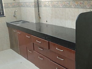 Kitchen in 2 BHK Apartment at K Raheja Palm Spring, Malad West – for Sale