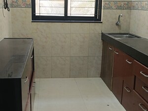 Kitchen in 2 BHK Apartment at K Raheja Palm Spring, Malad West – for Sale
