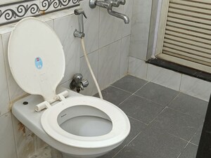 Bathroom in 2 BHK Apartment at K Raheja Palm Spring, Malad West – for Sale