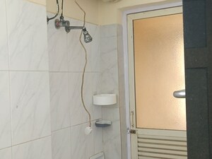 Bathroom in 2 BHK Apartment at K Raheja Palm Spring, Malad West – for Sale