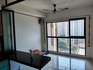 Living Room in 1 BHK Apartment at Lodha Crown Quality Homes, Majiwada – for Rent