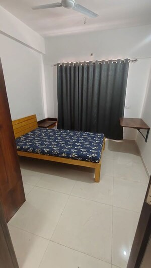 Bedroom in 2 BHK Apartment at Goel Ganga Altus, Kharadi – for Rent