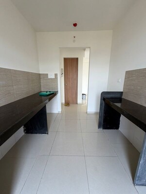 Kitchen in 2 BHK Apartment at Godrej Emerald, Ghodbunder Road – for Rent