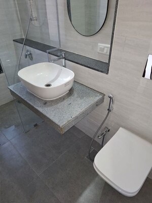 Bathroom in 3 BHK Apartment at Je And Vee Om Trimurti, Malad East – for Sale