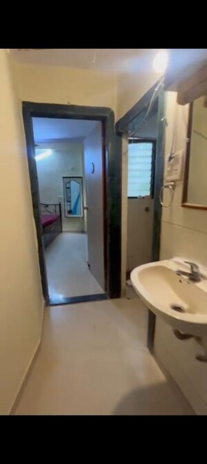 Bathroom in 1 BHK Apartment at Laxmi CHS Andheri East, Andheri East – for Rent