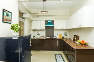 Kitchen in 2 BHK Apartment at Exotica Dreamville, Sector 16c Greater Noida – for Rent