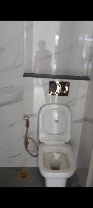 Bathroom in 3 BHK Apartment at Smart World Orchard, Sector 61 – for Rent