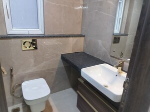 Bathroom in 3 BHK Apartment at Smart World Orchard, Sector 61 – for Rent