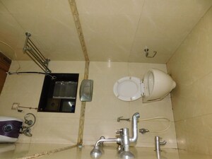 Bathroom in 1 BHK Apartment at Surat Bahar Apartments, Azad Nagar Colaba – for Sale