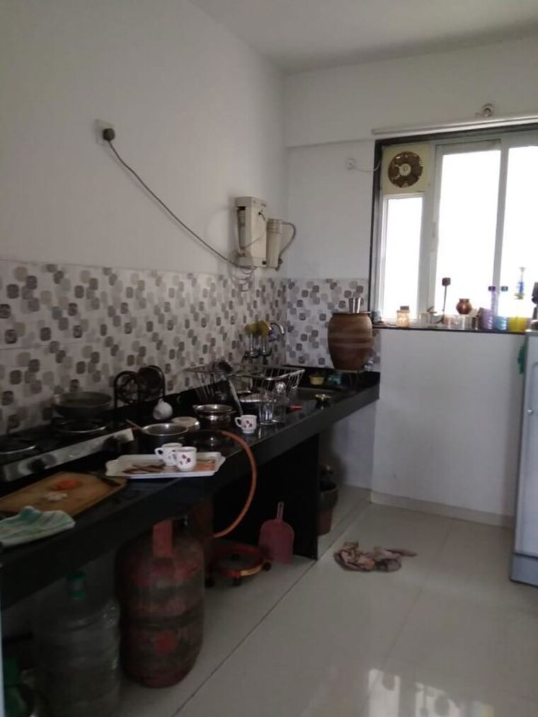 Kitchen, punawale 2 Bedroom 804 Sq.Ft. Apartment In Punawale Pune 10342099