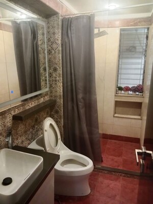Bathroom in 2 BHK Apartment at The Advantage Raheja Windermere, Andheri West – for Sale