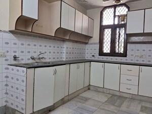 Kitchen in 4 BHK Builder Floor at Chirag Enclave – for Sale