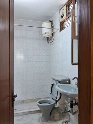 Bathroom in 4 BHK Builder Floor at Chirag Enclave – for Sale