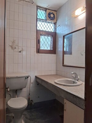 Kitchen in 4 BHK Builder Floor at Chirag Enclave – for Sale