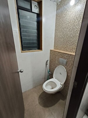 Bathroom in 1 BHK Apartment at Lodha Lakeshore Greens, Dombivli East – for Rent