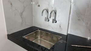 Bathroom in 2 BHK Apartment at Giritirtha Solasta, Ravet – for Rent